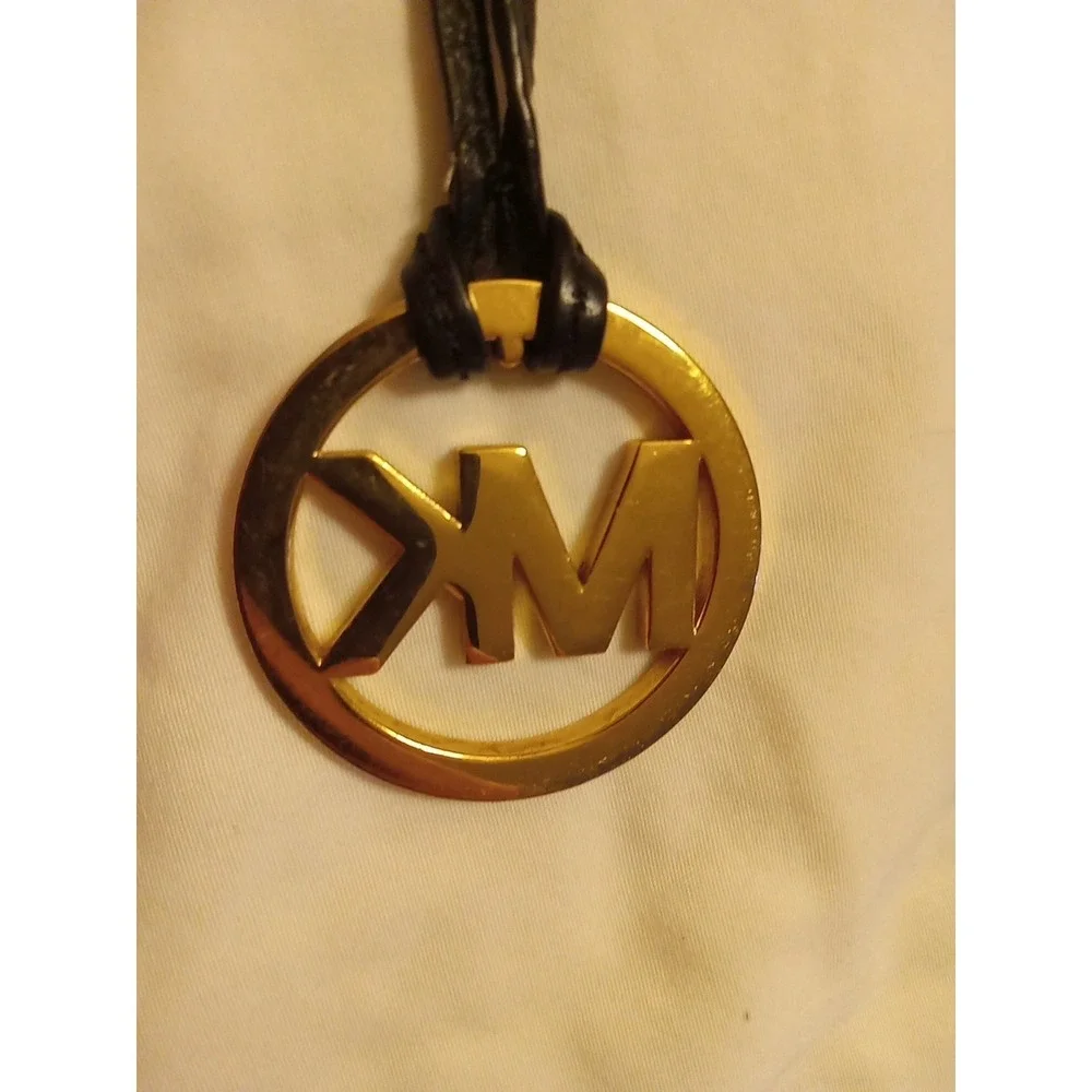 Michael Kors Gold Tone MK Logo Charm Hang Tag Luggage color Leather Strap
